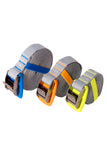 Three Sea to Summit Bomber Tie Downs featuring gray polyester webbing with reflective stitching, each rolled up and secured with a cam buckle in blue, orange, and yellow.