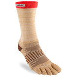 The Injinji Women's TRAIL Midweight Crew sock features beige and brown stripes, a red cuff, the Injinji logo, and individual toe compartments—perfect for blister prevention during women’s trail running.