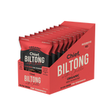 A red box displays multiple packs of Chief Beef & Chilli Biltong by Chief Nutrition, an organic, grass-fed, preservative-free snack. This healthy treat is slow air-dried to perfection for flavorful enjoyment.