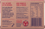 Back of a Crafty Weka Bar 75g box from Crafty Weka, highlighting nutritional facts, ingredients, and contact info, with focus on fiber, protein, natural ingredients, eco-friendly packaging, and sustained energy.