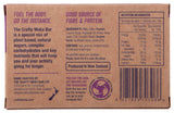 Back of a Crafty Weka Bar 75g by Crafty Weka, featuring product info, natural ingredients, nutrition facts, contact details, and recycling instructions on a brown background—ideal as your outdoor energy bar for lasting energy.