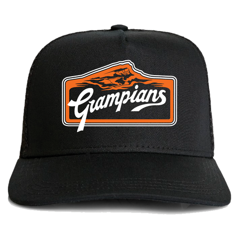 Black baseball cap with an orange and white "Absolute Outdoors Frontier Truckers Cap" logo featuring a mountain silhouette by Machine Printers.