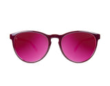 A pair of red-framed Knockaround Mai Tai sunglasses with pink tinted, impact-resistant lenses isolated on a white background.
