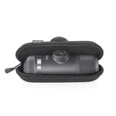 The Wacaco Nanopresso Case, made from durable EVA material, is partially open to reveal a lens. Its black exterior with a zippered closure resembles the sleek design of premium barista kits.