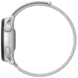 Side view of a Coros Pace 3 GPS Sport Watch with a grey metal mesh band and white casing, featuring advanced technology with a side button and crown for turn-by-turn navigation.