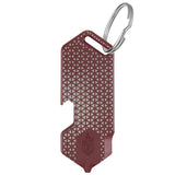 The Gerber Shard DT by Gerber is a maroon multi-tool keychain with a textured triangular pattern, metal keyring, bottle opener slot, and small triangular logo—perfect as a travel-friendly tool for everyday use.