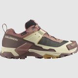 The Salomon X Ultra 5 Women's Hiking Shoe is a trail-running shoe in maroon, beige, and black, featuring a rugged sole and lace-up closure. It includes Matryx® technology for durability and has a visible side logo.