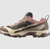 The Salomon X Ultra 5 Women's Hiking Shoe features a rugged Contagrip sole and a mixed-material upper in pink, black, and beige.