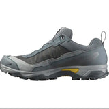 The Salomon X Ultra 5 Men's Hiking Shoe by Salomon is gray and black, featuring a rugged Contagrip sole, mesh upper, and yellow midsole accent for better traction.