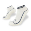 Two white ankle socks with dark grey trim and detailing, shown from different angles against a plain white background. Experience the quality of Wilderness Wear 10K Merino Socks, crafted for breathable performance with soft merino wool.