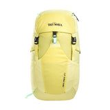 The yellow Tatonka Hike Pack, labeled "Hike Pack 27," features multiple pockets, a front strap, and a ventilated mesh back panel. Made from recycled materials, it's perfect for eco-conscious adventurers.