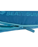 Close-up of the blue Sea to Summit Venture VTI Sleeping Bag showing the brand logo, THERMOLITE® insulation label, and partially unzipped zipper.
