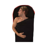 Man in a Sea to Summit Reactor Thermolite Sleep Liner with exposed shoulder, eyes closed, against a white background.