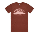 The rust-colored Absolute Outdoors Men's Grampians Peaks Trail Tee by Machine Printers showcases Brett Mallon's design with "Grampians Peaks Trail" and a decorative white graphic on the front.