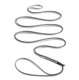 A long silver metal abrasion-resistant flexible tube cable coiled in an abstract, looping pattern on a white background Black Diamond 10MM Dynex Runners.