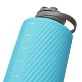 Close-up of the Hydrapak Flux Bottle 1.5L, a lightweight and compact silicone water bottle in blue, with a gray cap and volume markings up to 1000 ml on its textured surface. Designed by Hydrapak, it features a flexible structure and high flow nozzle for efficient hydration.