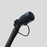 Close-up of the HydraPak Force Bladder by HydraPak, featuring a black pump head connected to a high-flow textured hose, set against a plain light gray background.