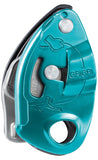 A teal and silver belay device labeled "Petzl Gri Gri," featuring a handle and a rope slot, designed for use with single ropes and incorporating assisted braking for climbing safety.