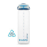 The Hydrapak Recon 1 Litre Bottle by Hydrapak boasts a clear design with a blue twist cap and measurement markings, made from 50% recycled plastic for eco-friendliness.