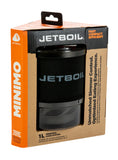 The Jetboil MiniMo Cooking Stove features a sleek black design with bold "JETBOIL" branding, utilizing FluxRing technology for a fast, compact, and efficient cooking experience. It offers precise simmer control for optimal heating in backpacking scenarios.