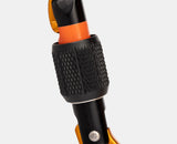 The Mammut Sender Screwgate Carabiner is stylishly designed in black, orange, and gold with a knurled grip, making it ideal for climbing or securing equipment. This carabiner is lightweight and equipped with a screw-locking mechanism to ensure enhanced safety and peace of mind.