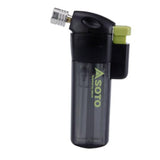 The Soto Pocket Torch by Soto features a black and translucent design with a green ignition button, wind-resistant burner, and "SOTO" branding. Enjoy a 1300°C flame for reliable performance wherever you go.