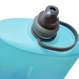 A close-up of a HydraPak Stow Bottle 1L by HydraPak, with a grey cap, featuring a built-in loop and flexible bail handle for carrying, making it an ideal trail companion.