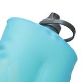 Close-up of a blue HydraPak Stow Bottle 1L featuring a spill-proof nozzle, gray cap, and flexible bail handle, perfect as a trail companion.