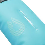 A close-up of a blue HydraPak Stow Bottle 1L featuring a vertical indentation, a geometric droplet logo printed on the surface, and a flexible bail handle. Ideal as a trail companion with its spill-proof nozzle.