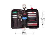 Open Survival Compact First Aid Kit by Survival First Aid displaying various medical supplies and tools including scissors, gloves, and bandages, with dimensions of 22 cm by 15 cm.