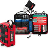 The Survival Handy First Aid Kit by Survival First Aid is open, revealing its contents, which include bandages, scissors, gloves, a triangular bandage, antiseptic wipes, an emergency blanket, a CPR mask, and a first aid booklet.