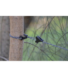 Black Sea to Summit adjustable cable clips securing a Sea to Summit The Clothesline to a wooden post with a blurred natural background.