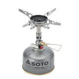 A close-up of a Soto WindMaster stove burner equipped with micro regulator technology, ideal for use in windy conditions.