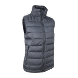 The 3 Peaks Women's Down Vest is a gray, sleeveless, quilted puffer vest with a front zipper and high collar. It boasts a high warmth to weight ratio and is water repellent, making it perfect for unpredictable weather.