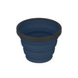 The Sea to Summit X Cup 250ml, a collapsible mug from Sea to Summit, is made of food-grade silicone and features a blue and black design.