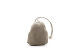 A small eco-friendly Grimpi Coloured Chalk Sock 100g canvas drawstring bag by Absolute Outdoors isolated on a white background.