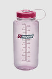 A transparent Nalgene Sustain Wide Mouth Bottle 1000ML with pink lid, marked with volume measurements on its side, isolated on a white background.