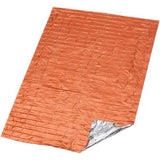 The SOL Emergency Blanket by SOL is a rectangular orange and silver vacuum-metalized polyethylene blanket shown laid flat, with one corner folded to display the reflective silver underside.
