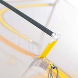 Close-up of a suction cup attachment on a clear surface with a black rod and Mont Moondance 2 Tent details.