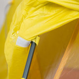 Close-up of a yellow Mont Moondance 2 tent corner with a black pole and white patch repair.