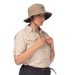 A person wearing a Mont water-resistant safari hat and shirt buttoning up the front.