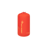A bright orange, lightweight, waterproof stuff sack made from durable nylon with a drawstring closure, featuring the Sea to Summit logo and "Ultra-Sil" text printed on the front. Ideal for modular packing.