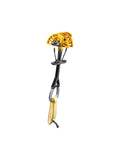 Close-up of the Black Diamond Camalot Ultralight Cams, showcasing a yellow sling, dual axles, black stem, and Dyneema cord for lightweight yet secure rock climbing protection.