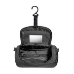 The Tatonka Care Barrel Wash Bag by Tatonka features a black design, an open main compartment, an unbreakable mirror built into the flap, and a sturdy hanging hook.