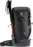 A Deuter Speed Lite 26 backpack with a pole attached, perfect for mountain hikes.