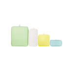 Here's the rewritten sentence using the provided product data:

Four differently sized and colored pouches from left to right: green, white, yellow, and blue, part of the Tatonka SQZY Pouch Set, made from durable siliconized polyamide material.