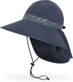 The Sunday Afternoons Shade Goddess by Sunday Afternoons is a navy blue wide-brim sun hat featuring a neck-caped silhouette and an adjustable chin strap, crafted from lightweight fabrics for optimal sun protection.