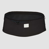 The Ultimate Direction Utility Belt by Ultimate Direction is a black no-bounce running belt featuring a small rectangular reflective patch on the front, shown against a plain light gray background.