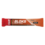 Clif Shot Blocks Energy Chews by clif, orange flavor with 25mg caffeine per 2.12 oz (60g) pack, provide carbohydrates for quick fuel and electrolytes to help replenish during activity, with product branding and details on the package.
