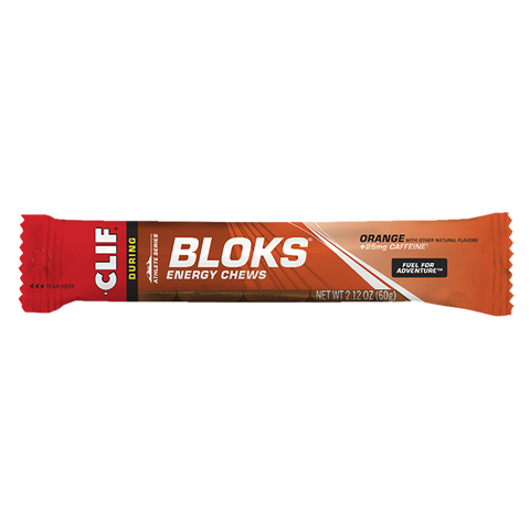 Clif Shot Blocks Energy Chews by clif, orange flavor with 25mg caffeine per 2.12 oz (60g) pack, provide carbohydrates for quick fuel and electrolytes to help replenish during activity, with product branding and details on the package.